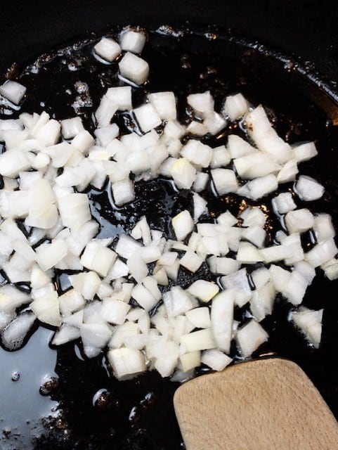diced onions being sauteed
