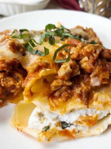 herb and ricotta filled pasta presented on a small plate close up