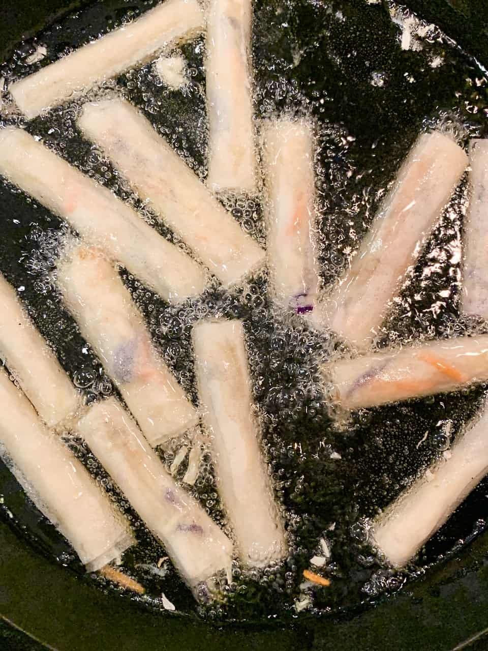 deep frying Filipino spring rolls
