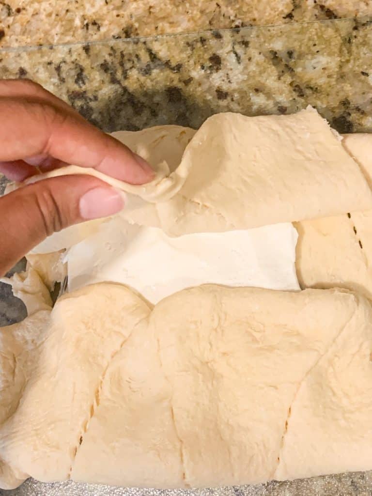 folded crescent rolls over cream cheese