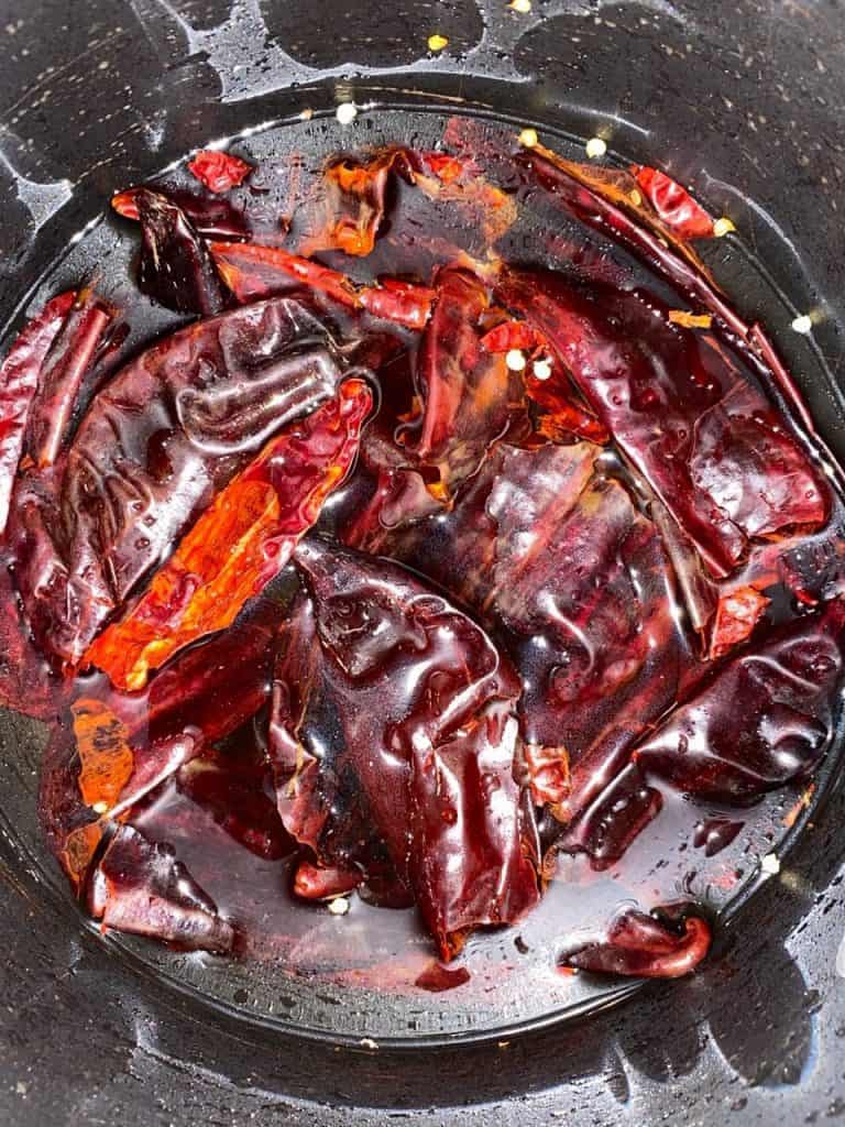 Chiles submerged in water