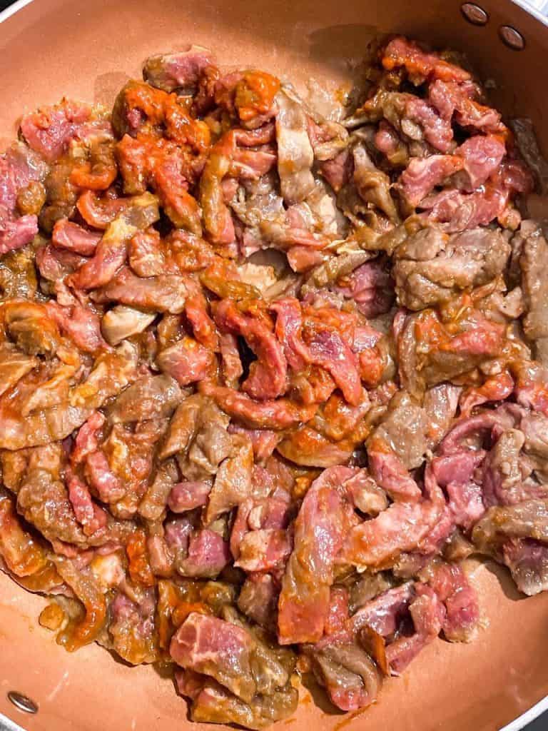 beef bulgolgi cooking in a pan