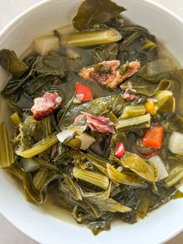 Collard greens in a white bowl