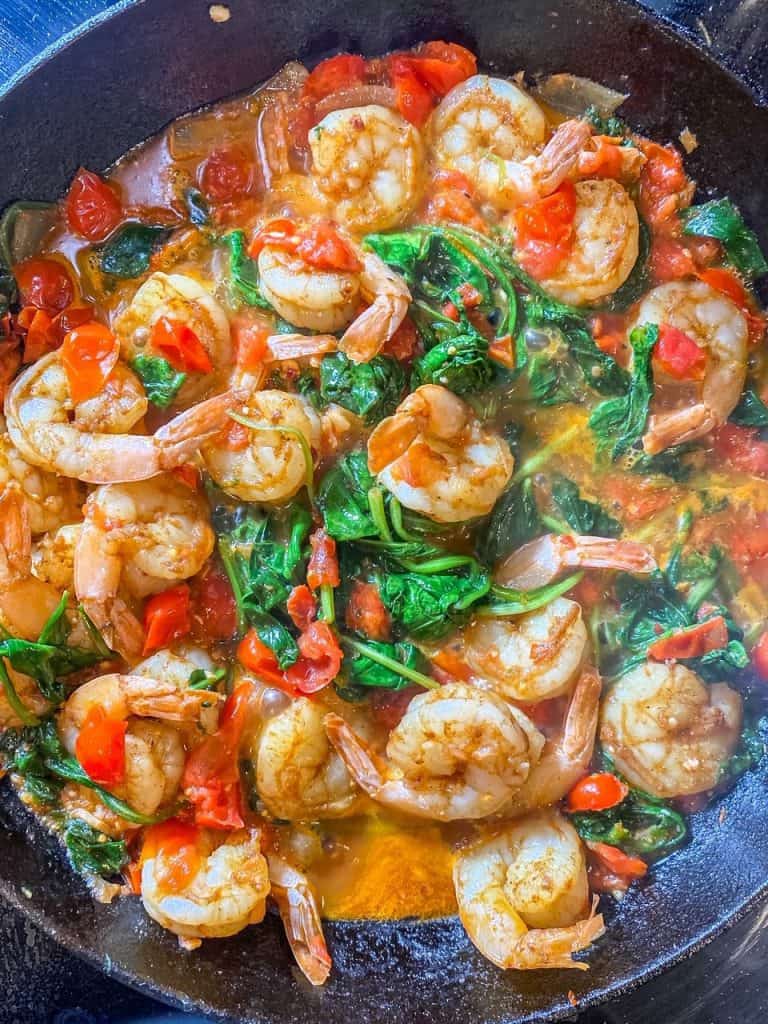 Garlic Butter Shrimp and Grits in the pan