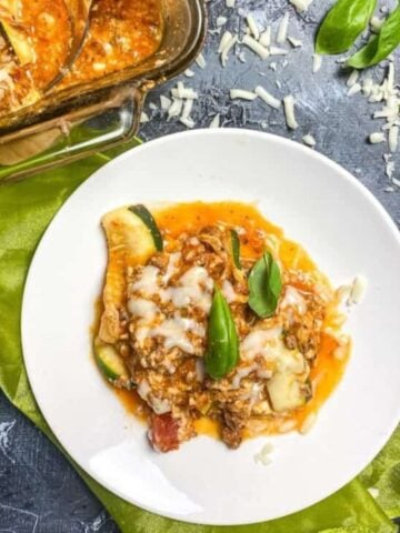 zucchini lasagna on a white plate
