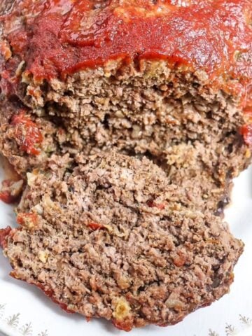 meatloaf on a platter cut into a slice