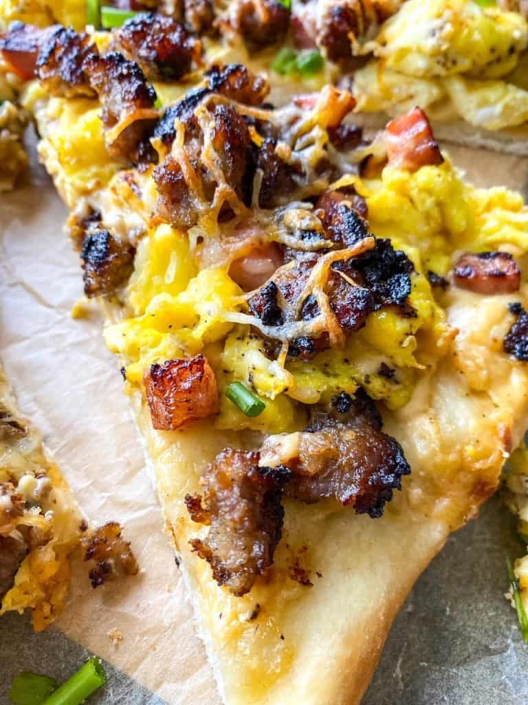 up close slice of breakfast pizza