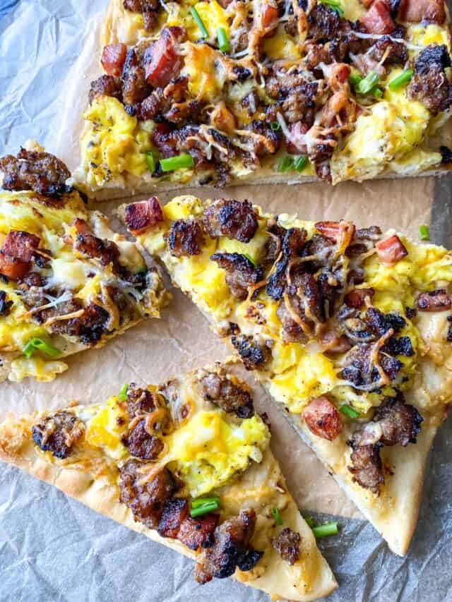 slices of breakfast pizza at a side angle