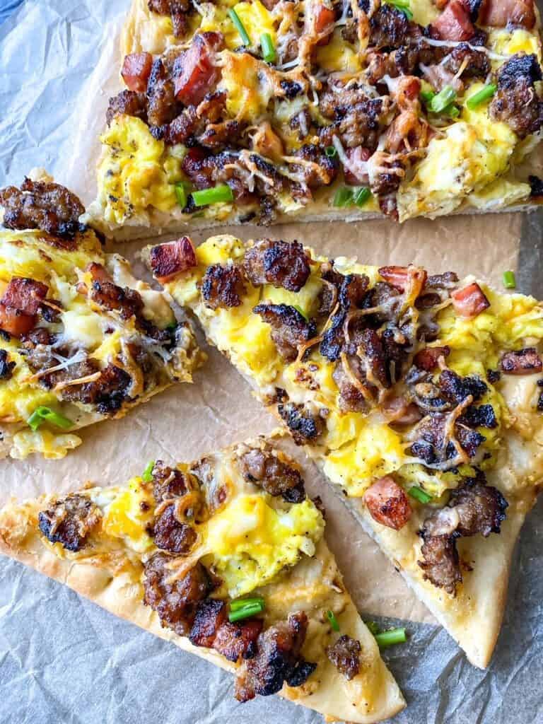 breakfast pizza slices of breakfast pizza at a side angle
