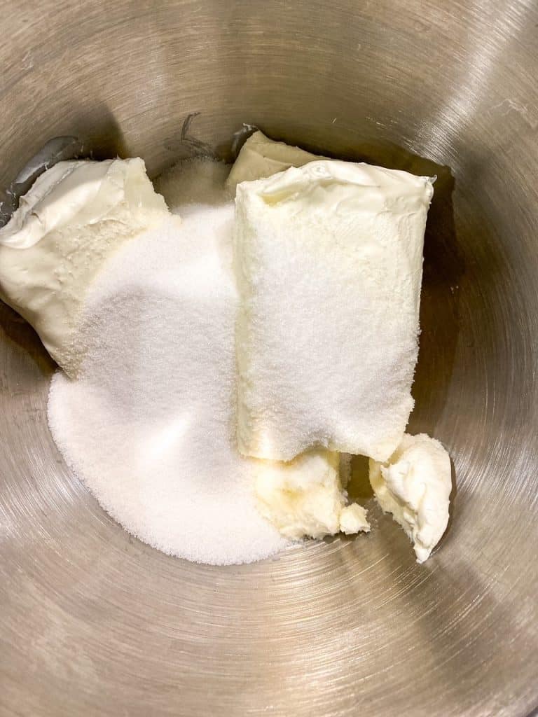 cream cheese and sugar in the stand mixer