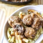 close up of swedish meatballs over pasta