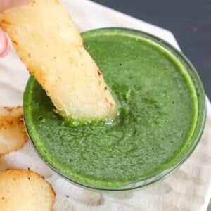 fried yuca dipped into green mojo sauce