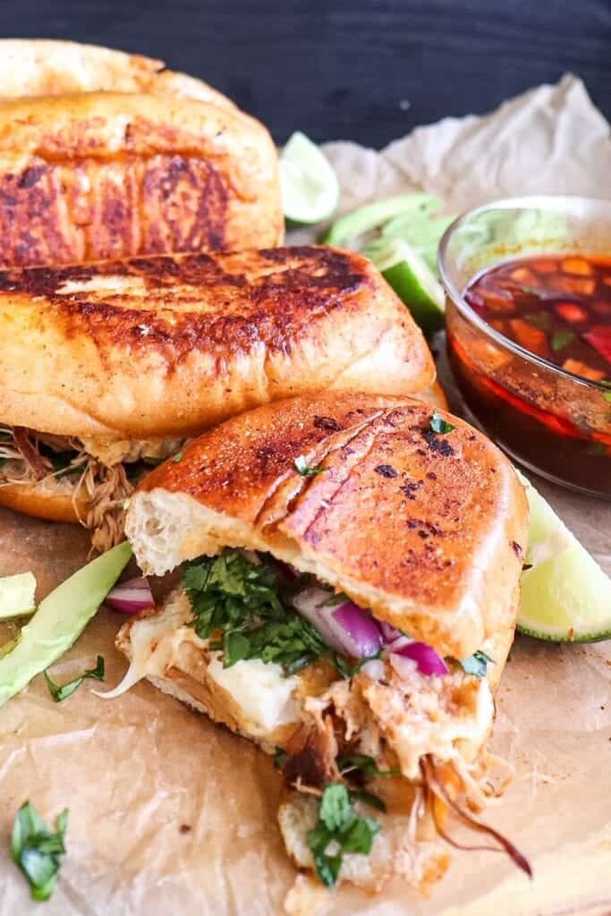 overhead view of chicken birria grilled cheese sandwiches