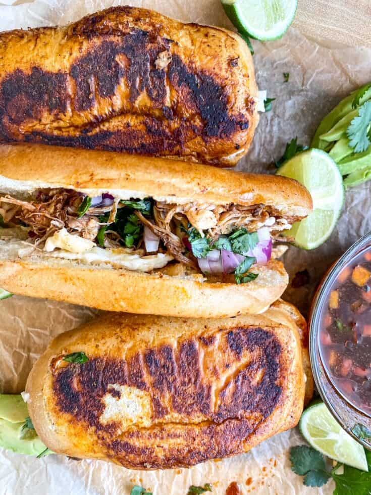 overhead view of chicken birria grilled cheese sandwiches
