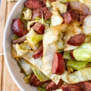 fried cabbage and sausage in a bowl