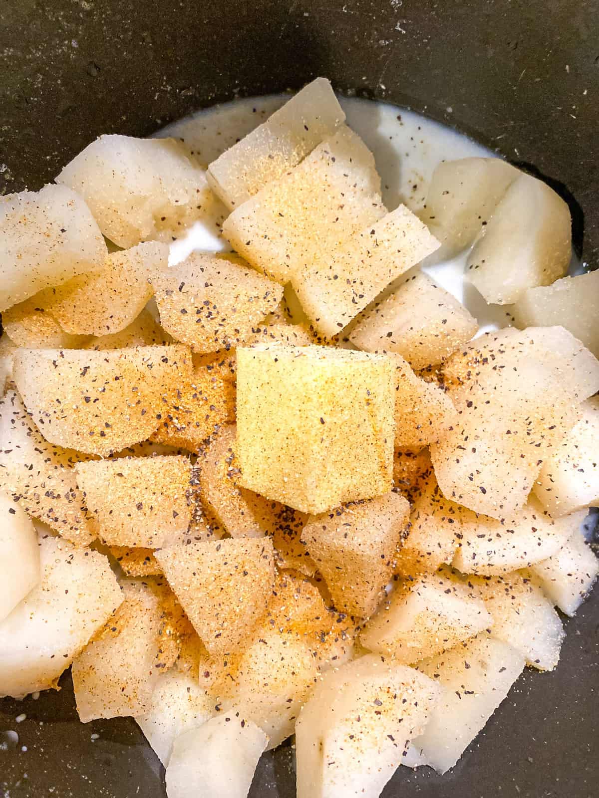 cooking potatoes to make mashed potatoes