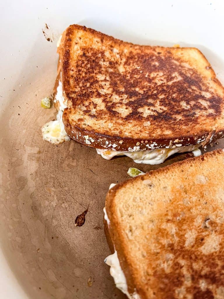 jalapeno popper grilled cheese in the skillet