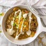 cheesy beef and potatoes with ranch dressing in skillet