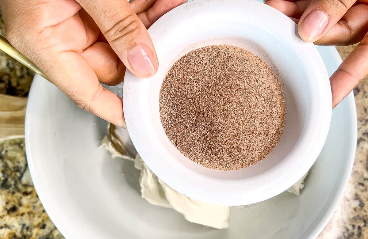 adding a cinnamon sugar mixture to mascarpone cheese for stuffed French toast