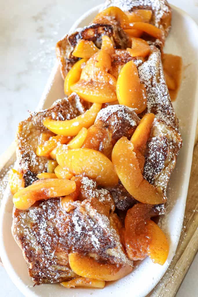 a platter of peach French toast