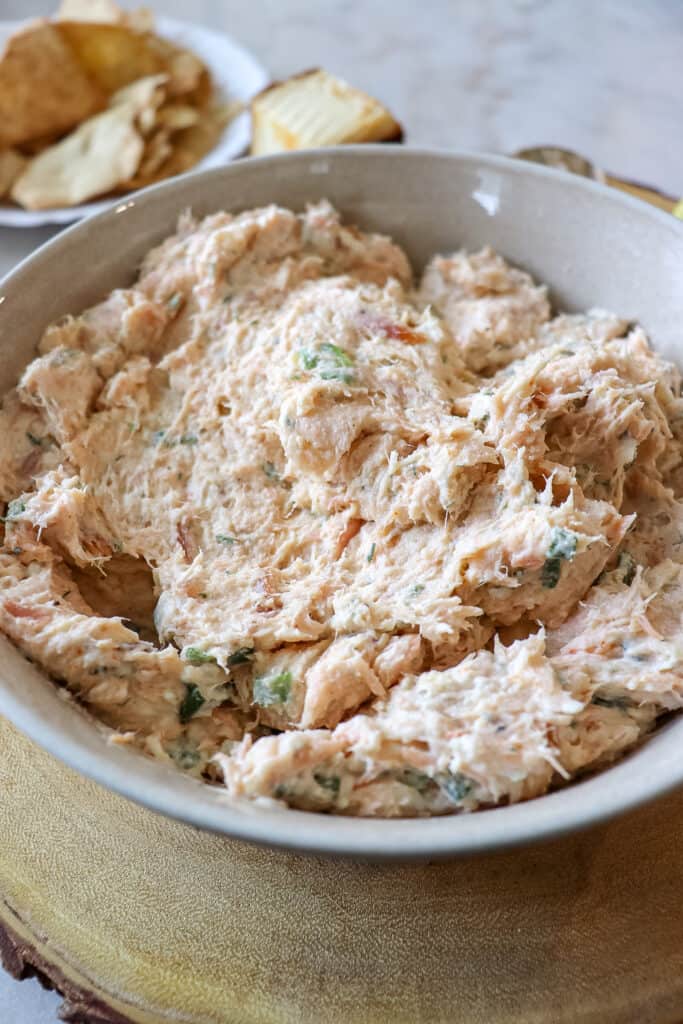 A close up view of a bowl of smoked salmon dip