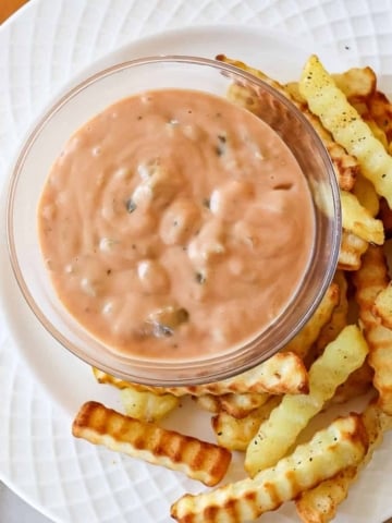 in and out copycat sauce in a bowl surrounded by French fries