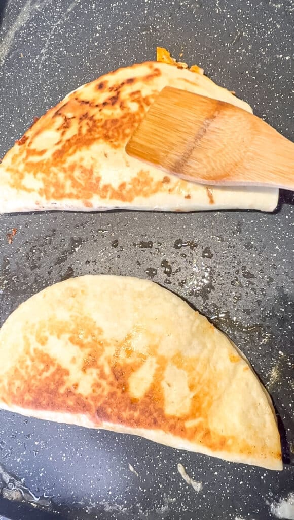 Two grilled buffalo chicken quesadillas.