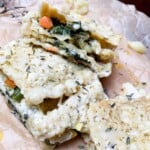veggie lasagna stacked on top of each other on a tray