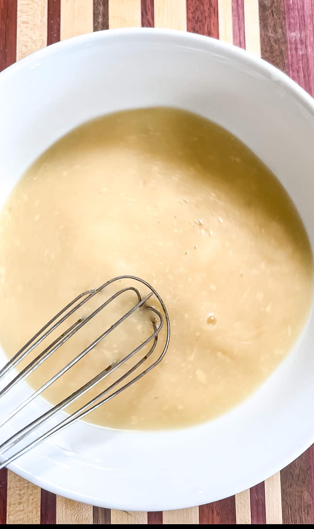 cream of chicken and cream of mushroom mixed up in a bowl