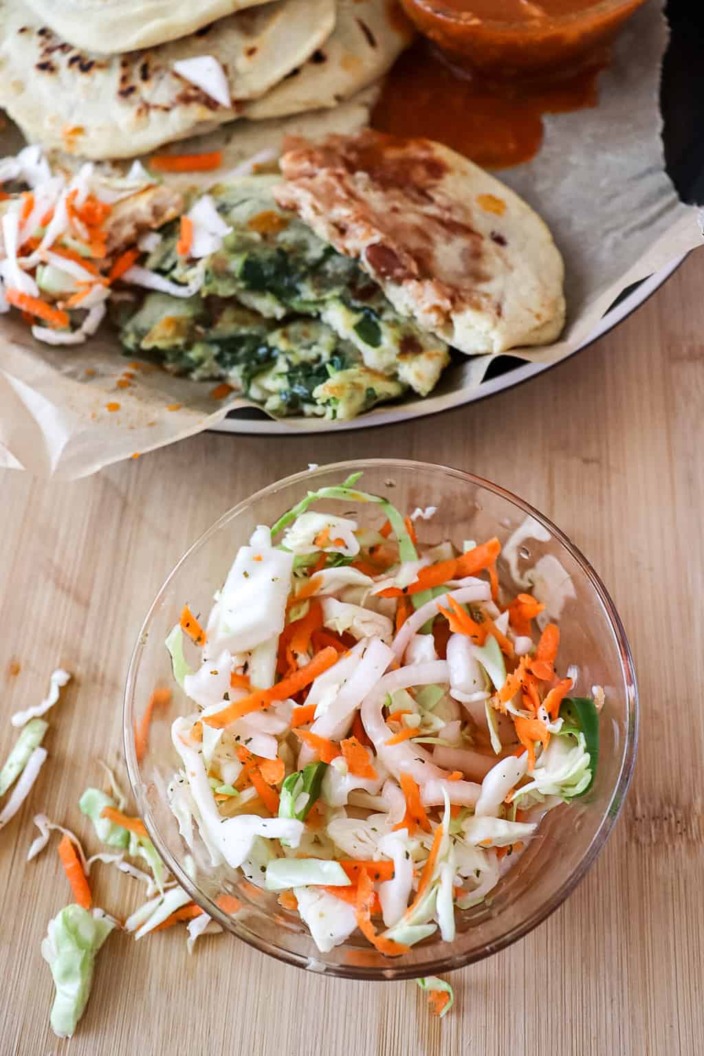 Salvadoran curtido slaw in a small bowl on the table