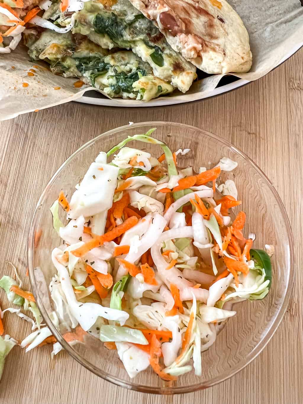 Salvadoran curtido slaw in a small bowl on the table