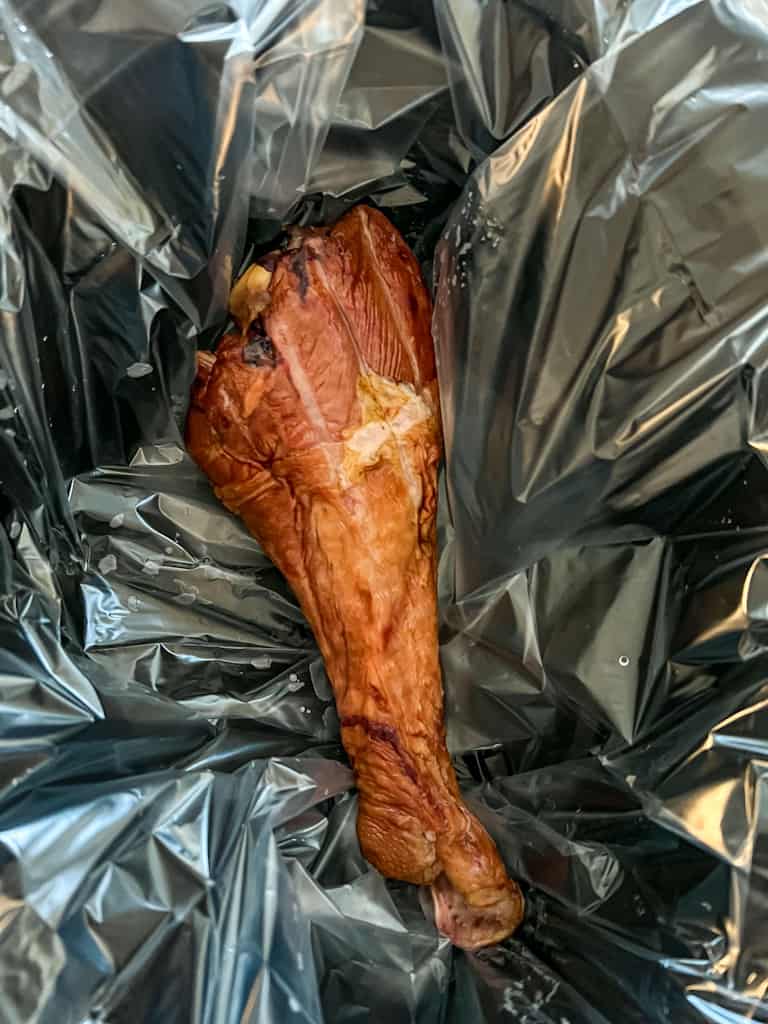 smoked turkey leg in a slow cooker