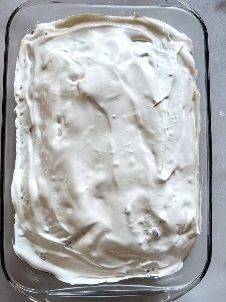 cake coated in whipped topping