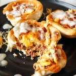 three plated biscuit breakfast bowls