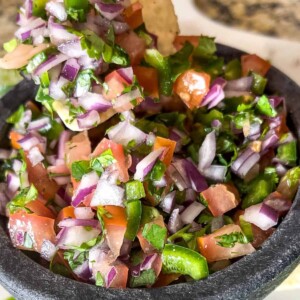 close up view of a bowl of pico de gallo