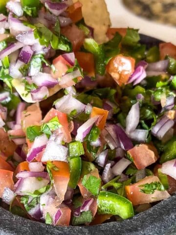 close up view of a bowl of pico de gallo