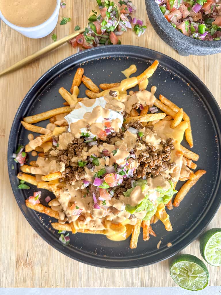 overhead view of a plate of nacho fries