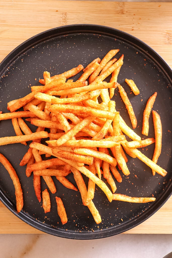 seasoned fries on a plate