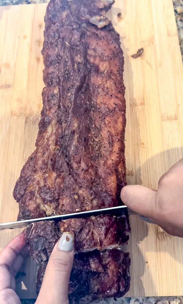 slicing slabs of meat