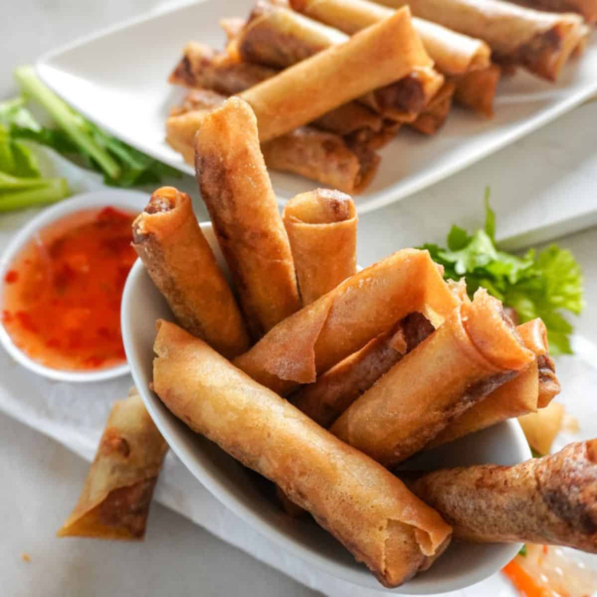 plated spring rolls with dipping sauce