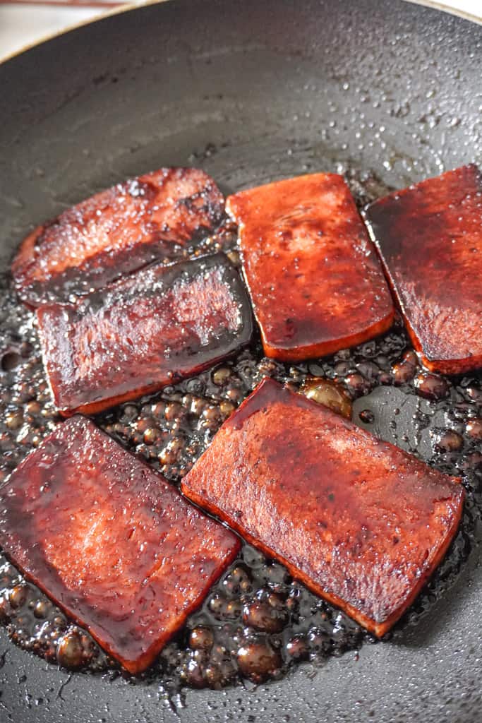cooked spam in a pan