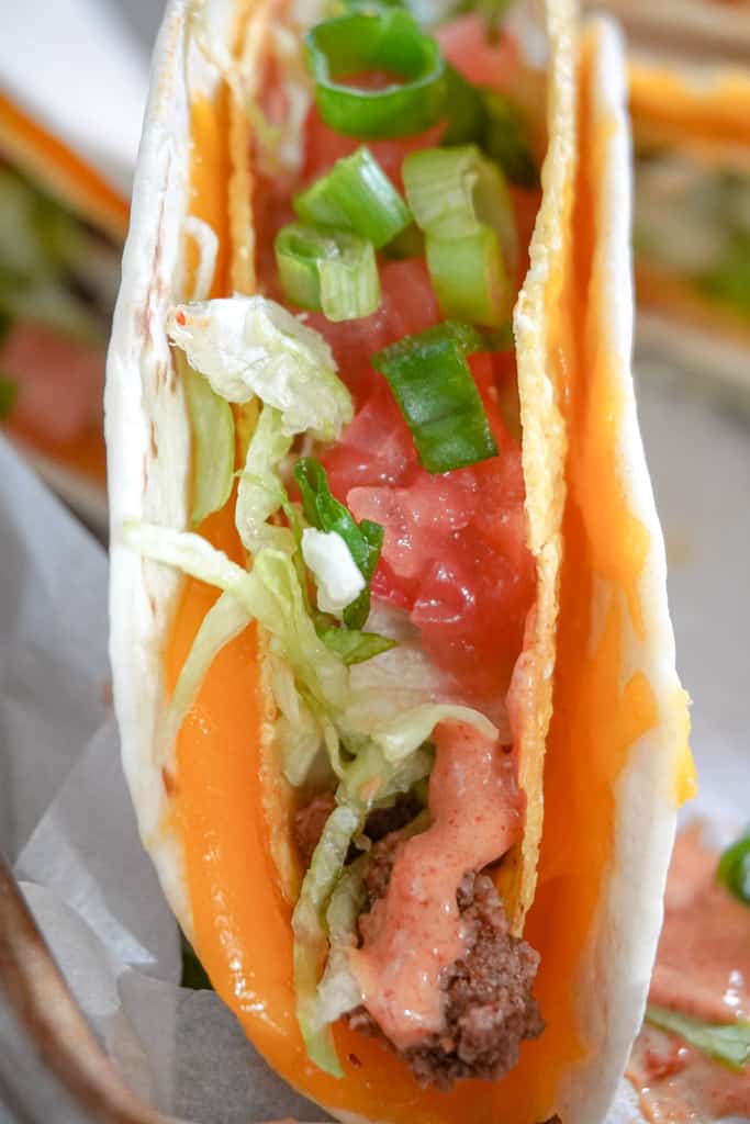 close up view of a double decker taco