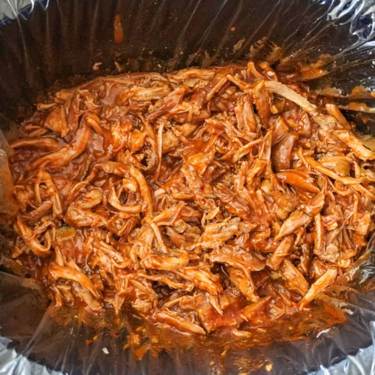 close up view of slow cooker pulled pork