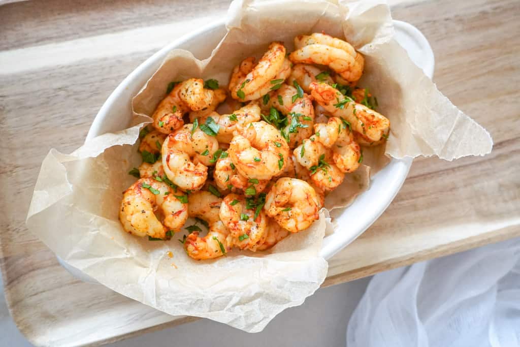 a dish full of cooked air fryer shrimp