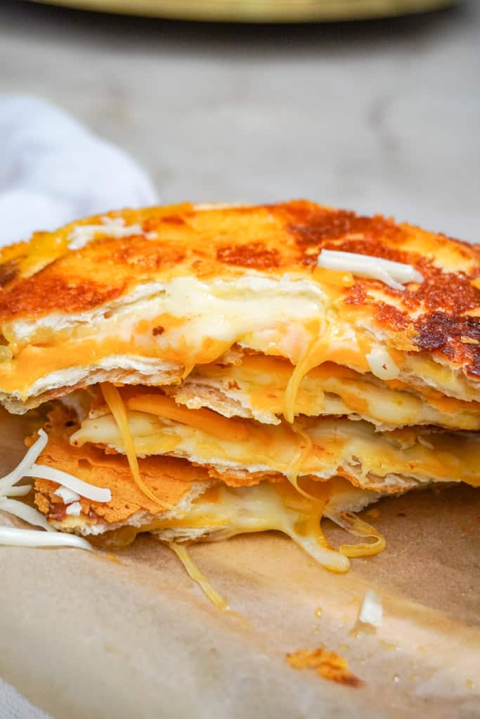 cheese quesadilla cut to reveal gooey center
