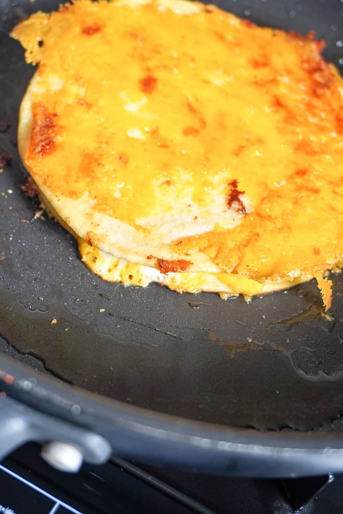 pan searing a cheese crusted quesadilla