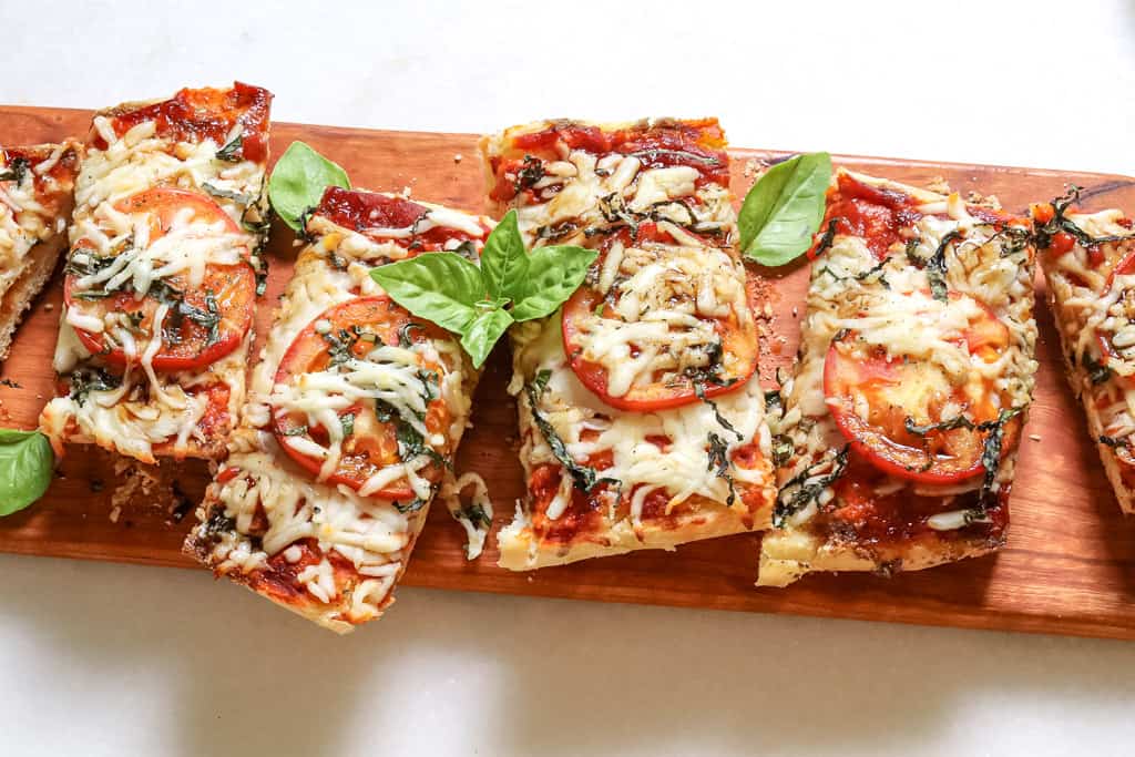 horizontal view of sliced french bread pizza