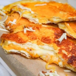 cheese quesadilla cut to reveal gooey center