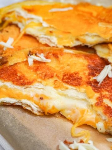 cheese quesadilla cut to reveal gooey center