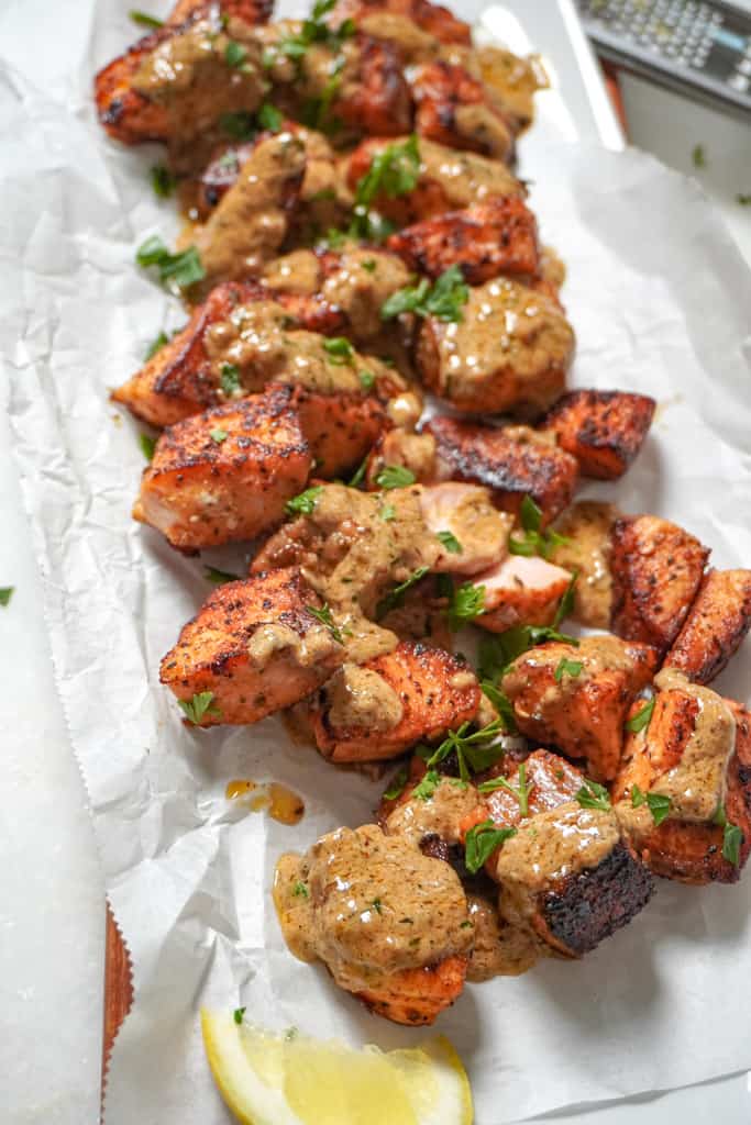 plated salmon bites with cajun garlic butter